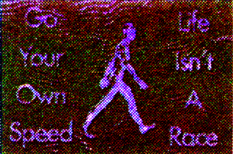 An animated loop of a figure walking to the right across a heavily grained red and green risograph texture, with “Go Your Own Speed” stacked at the left and “Life Isn’t A Race” at the right in rough white type.